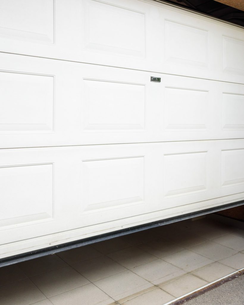 Garage door PVC. Hand use remote controller for closing and open